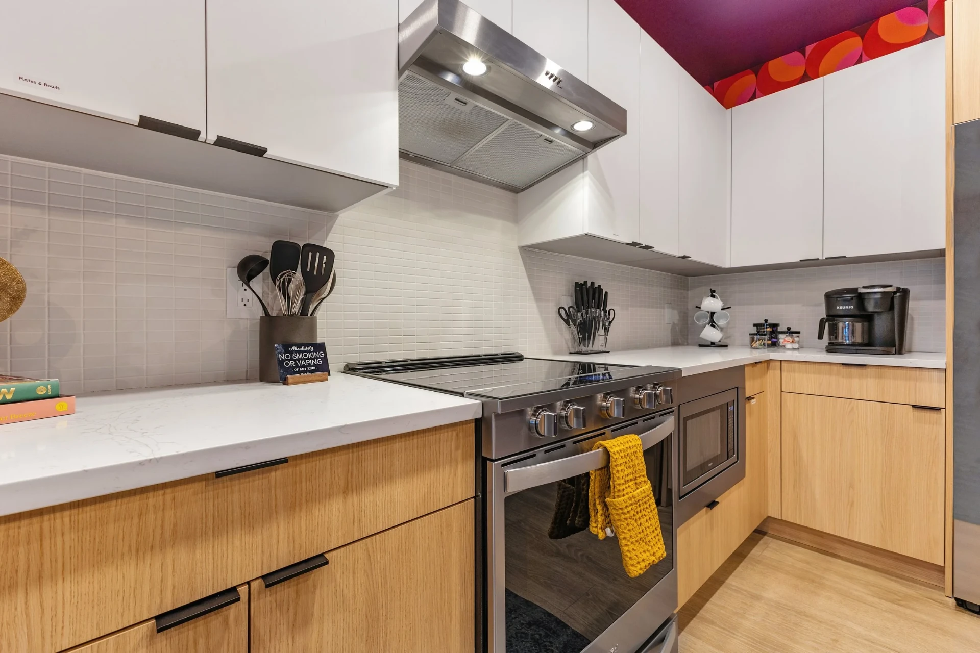 Chef's kitchen with stainless range & Keurig bar